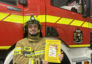 Przekazanie kartki do OSP Łuszczanowice